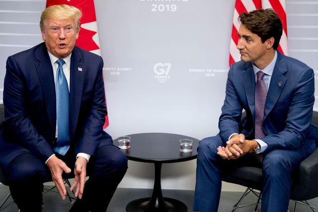 U.S President Donald Trump, accompanied by Canadian Prime Minister Justin Trudeau, right, speaks during a bilateral meeting at the G-7 summit in Biarritz, France